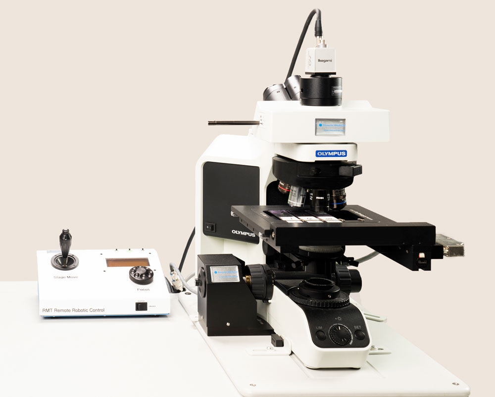 Microscope with robotic controls.